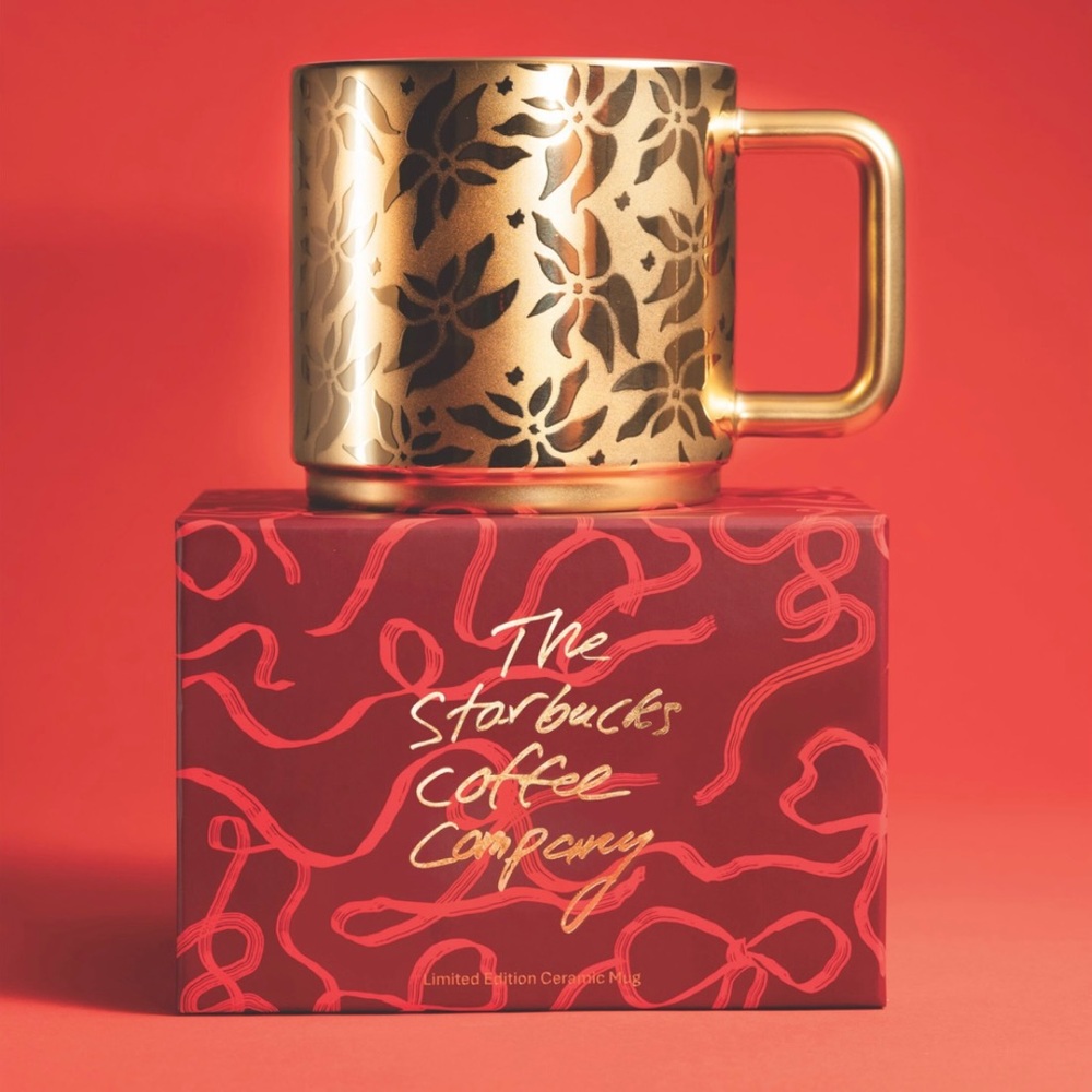 2025 Starbucks, gold poinsettia coffee cup. New with box.